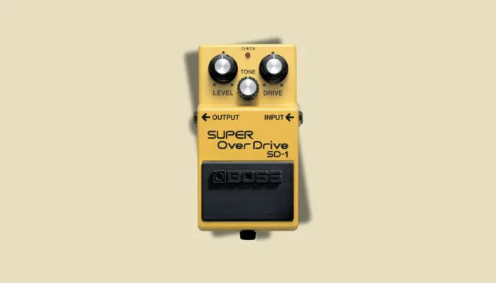 Boss SD-1 Super Overdrive – classic yellow overdrive pedal with three control knobs.