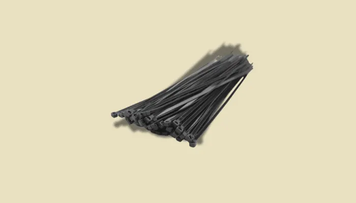 Photo of zip ties used to secure guitar pedals to a pedalboard.