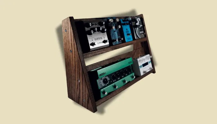 Photo of a clever DIY vertical pedal storage solution for guitar pedals.