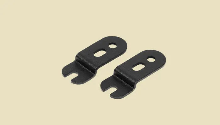 Photo of Helweg Design mounting brackets, a semi-permanent way to attach pedals to a board.