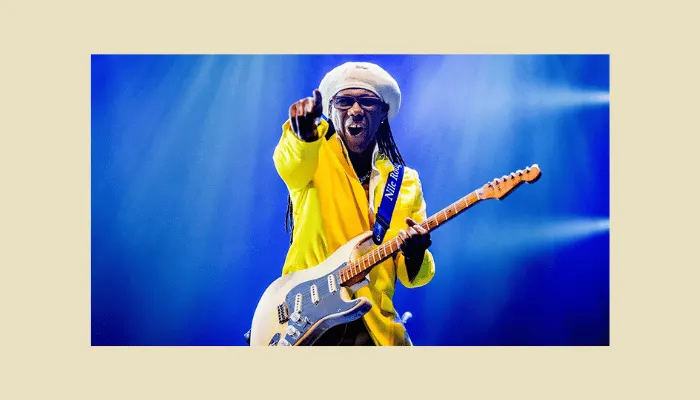 Photo of funk guitarist Nile Rodgers, known for his crystal-clear clean tone running almost straight into the amp.