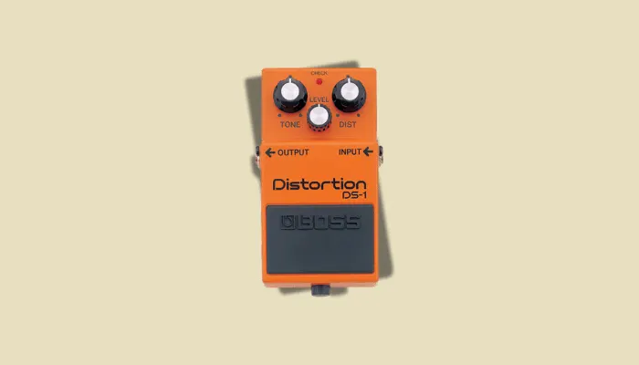 Illustration of a distortion effect, showing how a pedal heavily clips the guitar signal for an aggressive tone.