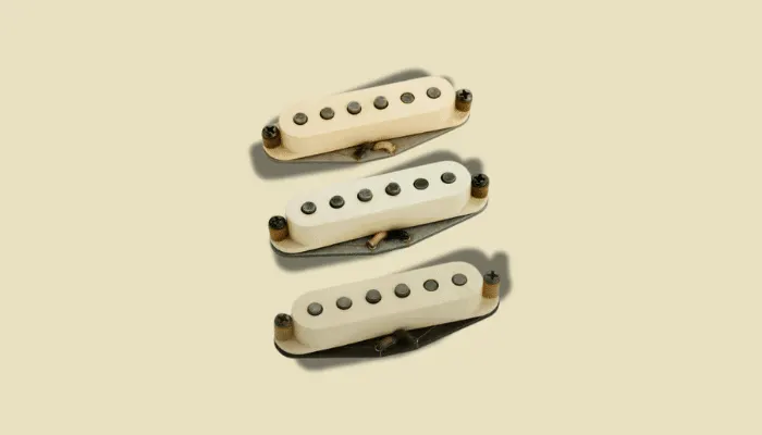 Infographic showing passive pickups, a high-impedance source feeding your guitar signal.