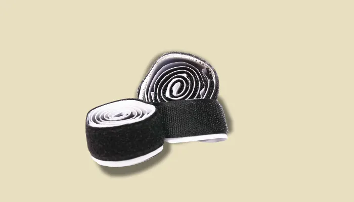 Photo of hook-and-loop Velcro strips used to attach guitar pedals to a pedalboard.