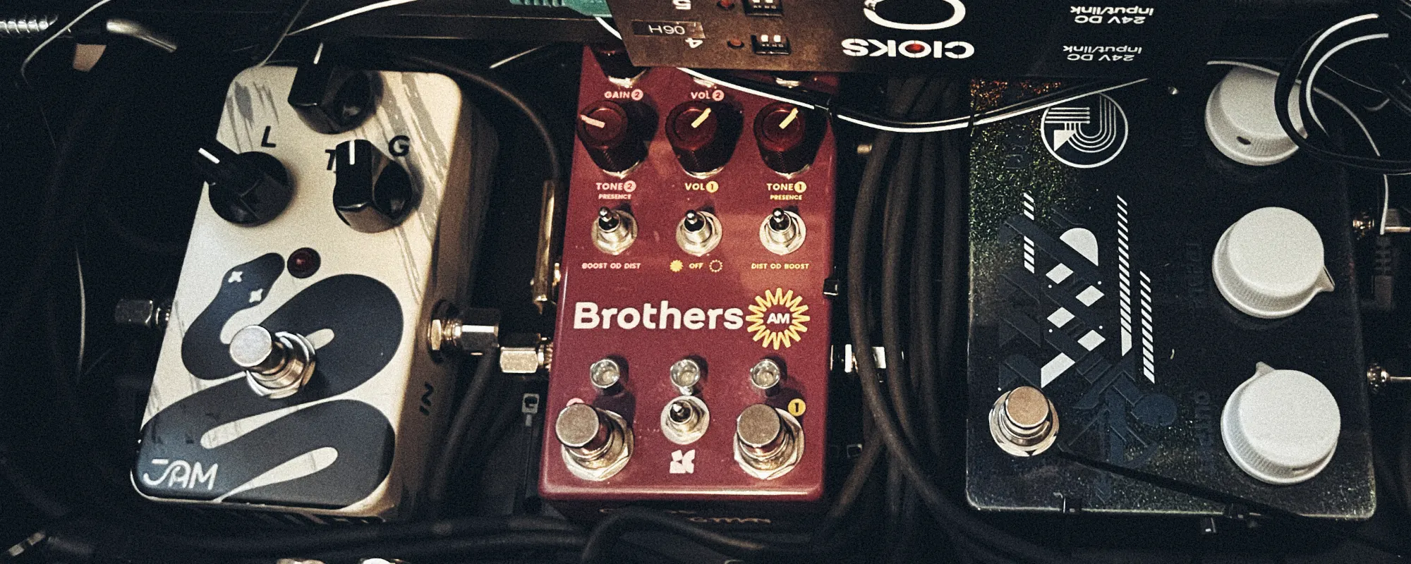 A zoomed-in section of the author's pedalboard — a Jam Pedals Rattler on the left, a Chase Bliss Brothers AM in the middle and a RYRA The Klone on the right