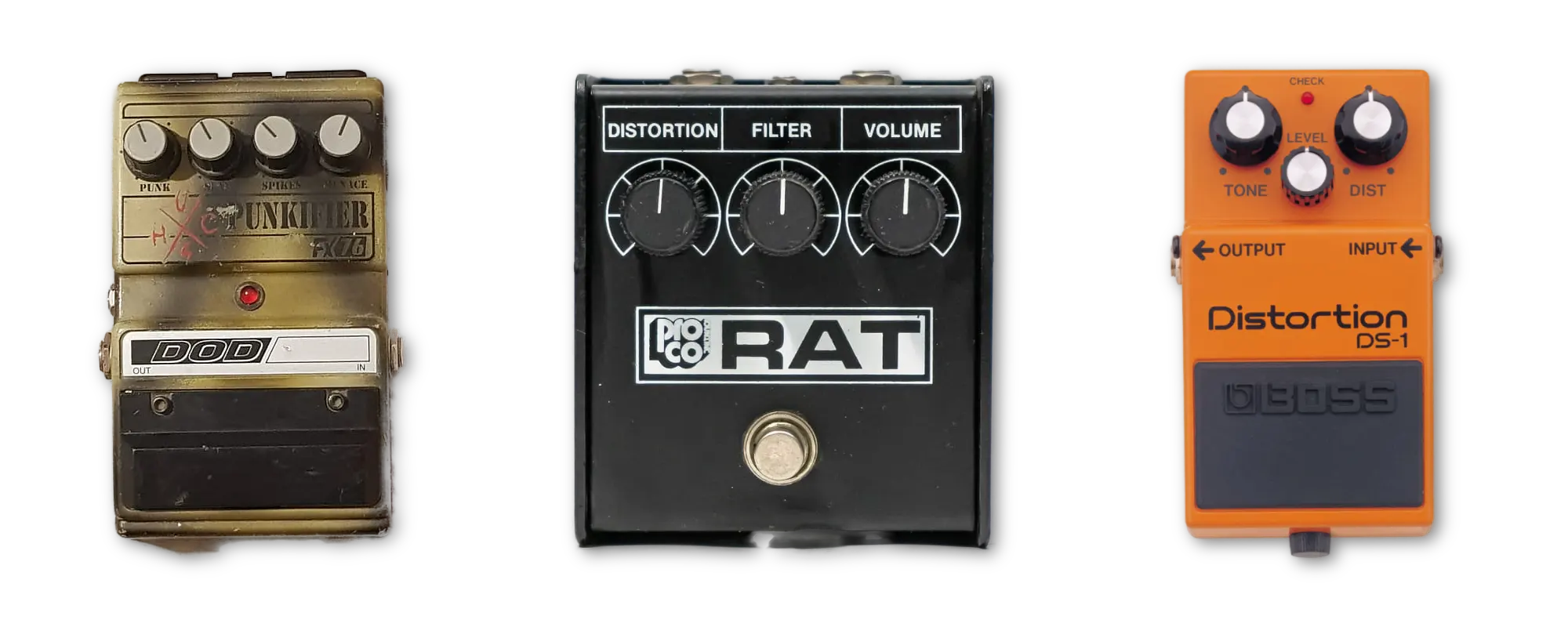 Three distortion pedals side by side — a Boss DS-1, a DOD FX76 Punkifier and a ProCo Rat — the boxes behind the misremembered grunge and Britpop tones